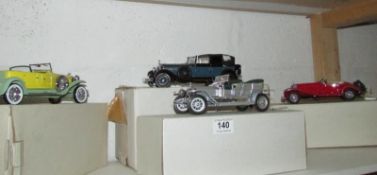 4 Franklin Mint model cars