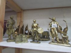 A quantity of brass figures etc