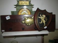 A Spratt's patent dog lead rack and a shield with crest
