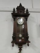 A mahogany Vienna wall clock