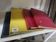 4 stamp albums including UK and world
