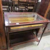A French Empire display table
 
Condition
In fair condition
Woodwork and brass require minor