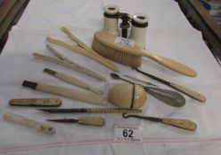 A mixed lot including opera glasses, glove stretchers, button hooks etc