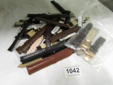 A quantity of leather watch straps including new and priced