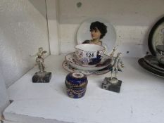 A 19th century Sunderland trio, a wall plates, a pill box and a pair of 18th century style figures