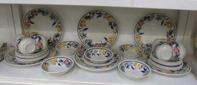 A fruit decorated tea and dinner set