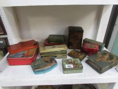 A mixed lot of old tins
