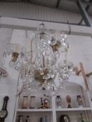 A 4 light glass chandelier