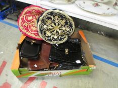 A leather satchel, other bags and 2 Eastern cushions