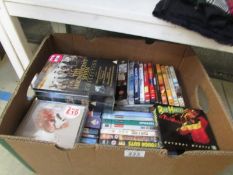 A box of CD's and DVD's