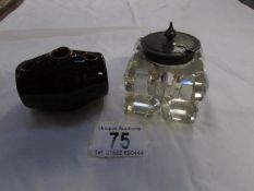 A Victorian salt glaze inkwell and a glass inkwell
