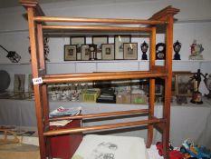 A mahogany inlaid towel rail