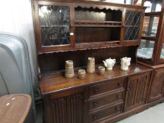 A good quality oak dresser with linenfold doors