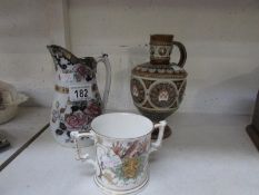 A Mettlach 19th a/f lustre jug, A Crown Derby loving cup and a jug