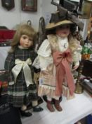 2 porcelain collector's dolls