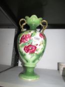 A Victorian twin handled Staffordshire vase