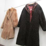 An Astrakan coat and a fur coat