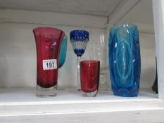 A glass celery vase, A footed bohemian goblet, Dartington glass vase and 3  others