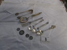 A mixed lot of silver plated cutlery and 4 silver coins