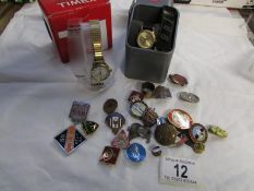 2 Ladies wrist watches and a quantity of badges including A.R.P., W.V.S., Primrose League, Crawfords