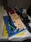 3 Tin Tin books including 'Herge and Tin Tin Reporter' and 6 Tin Tin toys