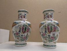 A pair of Chinese (Hong Kong) vases