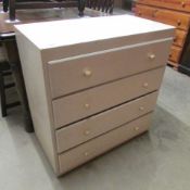 A painted 4 drawer chest