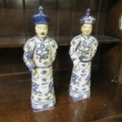 A pair of blue and white Oriental figures