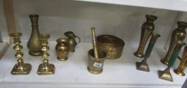 A mixed lot of glassware including candlesticks, pestle and mortar etc