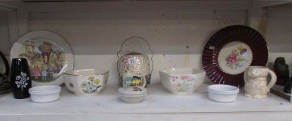 A quantity of Wade bowls, plates, vase and a/f biscuit barrel
