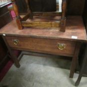 A small oak single drawer table