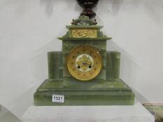 A green marble French mantel clock