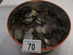 A tin of old coins