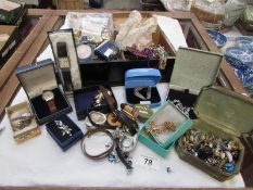 A large quantity of costume jewellery and watches together with a tie press box