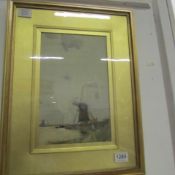 A framed and glazed watercolour of a windmill initialled H.F (possibly Henri Cassiers)