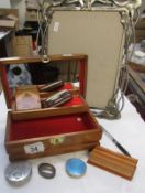 A jewellery box, other boxes and a photo frame
