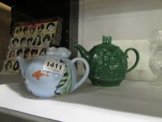 A Wade 'Owl and Pussycat' teapot and one other