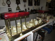 A brass club fender