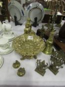 A mixed lot of Oriental themed brassware including Buddha's