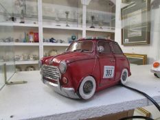 A table lamp in the form of a MIni car