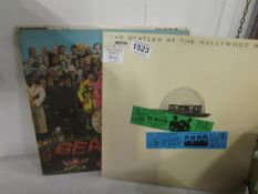 4 Beatles LP records including The Beatles at Hollywood Bowl, Sargeant Peppers etc