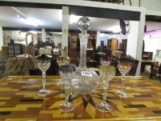 A glass decanter and 6 glasses