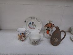 A Wedgwood Peter Rabbit cup and plate, a Pastille burner and 2 other items