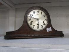 A three hole mantel clock, in working order