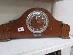 A three hole mantel clock in working order