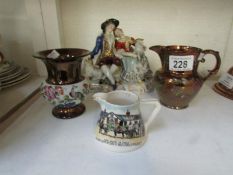 A lustre jug, luster vase, Goss jug and German figure group