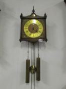 An AMS wall clock marked Tempus Fugit