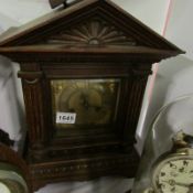 A Palladian style mantel clock