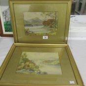 A pair of framed and glazed watercolour landscapes signed Read Wallace, overall 43 x 34cm, images 25