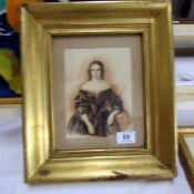 A framed and glazed hand tinted Victorian portrait, frame 37 x 33cm, image 14 x 19cm